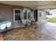 Covered front porch with chairs, offering a cozy and inviting outdoor space at 2387 Bill Smith Rd, Martinsville, IN 46151