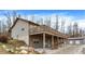Exterior view of the home featuring a two-story back deck and detached garage at 2389 Bill Smith Rd, Martinsville, IN 46151