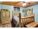 Comfortable bedroom with wood ceiling, light blue walls, and log-style furniture at 2389 Bill Smith Rd, Martinsville, IN 46151