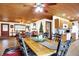 Open floor plan with hardwood floors in this dining room with views into the living room and kitchen area at 2389 Bill Smith Rd, Martinsville, IN 46151