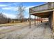Exterior view of deck with gravel drive, barn, and picturesque countryside at 2389 Bill Smith Rd, Martinsville, IN 46151