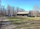 Ranch-style home with a covered front porch and detached two-car garage set on a generous lot at 2389 Bill Smith Rd, Martinsville, IN 46151