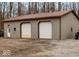 Large outbuilding with two garage doors, offering ample storage or workshop space at 2389 Bill Smith Rd, Martinsville, IN 46151