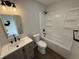 This bathroom offers a single vanity, a toilet, and a shower/tub combo at 2418 Shorewood Dr, Lebanon, IN 46052