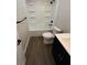 This bathroom features black fixtures, a tub/shower, and a vanity at 2418 Shorewood Dr, Lebanon, IN 46052