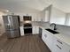 Modern kitchen featuring stainless steel appliances and sleek countertops at 2418 Shorewood Dr, Lebanon, IN 46052