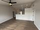 Open floor plan living space with recessed lighting and wood floors at 2418 Shorewood Dr, Lebanon, IN 46052