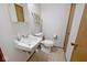 Bathroom has toilet, vanity sink and towel rack at 244 Corottoman Ct, Avon, IN 46123