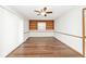 Bright dining room features hardwood floors and built-in shelving at 244 Corottoman Ct, Avon, IN 46123