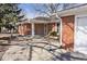 This home features a covered front entrance with a sidewalk leading to the driveway at 244 Corottoman Ct, Avon, IN 46123