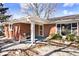 A quaint front porch with detailed columns provides a welcoming entrance to this charming home at 244 Corottoman Ct, Avon, IN 46123