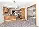 Kitchen with stainless steel appliances and breakfast bar, perfect for entertaining at 244 Corottoman Ct, Avon, IN 46123