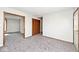 Spacious living room with neutral carpet and nearby closet at 244 Corottoman Ct, Avon, IN 46123