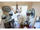 Overhead view of a dining area featuring a round table, chandelier, and hardwood floors at 2449 Chaseway Ne Ct # Blk B, Indianapolis, IN 46268