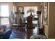 Spacious dining area featuring hardwood floors, a round table, and a sunlit window at 2449 Chaseway Ne Ct # Blk B, Indianapolis, IN 46268