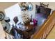 Overhead view of dining area featuring a round table, chandelier, and dark hardwood floors at 2449 Chaseway Ne Ct # Blk B, Indianapolis, IN 46268