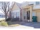 Two-story home with attached garage, covered front entryway, and compact, well-maintained landscaping at 2449 Chaseway Ne Ct # Blk B, Indianapolis, IN 46268