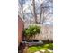 Backyard featuring a water feature and stepping stones that lead to a private garden area at 2615 Kessler Blvd E Dr, Indianapolis, IN 46220