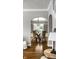 Elegant dining room with wood floors and view of the backyard, accessed by french doors at 2615 Kessler Blvd E Dr, Indianapolis, IN 46220