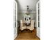 Inviting dining area with French doors offering abundant natural light and views at 2615 Kessler Blvd E Dr, Indianapolis, IN 46220