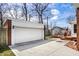 Detached two-car garage with a clean driveway, providing ample parking and storage space at 2615 Kessler Blvd E Dr, Indianapolis, IN 46220
