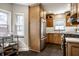 Bright kitchen features stainless steel appliances, wooden cabinets, and ample counter space at 2615 Kessler Blvd E Dr, Indianapolis, IN 46220