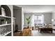 Bright living room featuring hardwood floors, neutral decor, and a cozy atmosphere at 2615 Kessler Blvd E Dr, Indianapolis, IN 46220