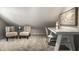 Cozy office space with comfortable seating and a white desk in a neutral color palette at 2615 Kessler Blvd E Dr, Indianapolis, IN 46220