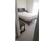 Bedroom showcases a cozy bed frame, comfortable mattress, and neutral-toned carpet at 2625 Kilgobbin Cres, Brownsburg, IN 46112