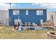 Backyard featuring a deck and lush lawn, offering a spacious outdoor area for leisure and activities at 3132 W Meadowbend Dr, Monrovia, IN 46157