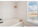 Bright bathroom with a soaking tub and a window view at 3132 W Meadowbend Dr, Monrovia, IN 46157