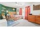 Charming bedroom featuring a cozy bed, rocking chair, and unique decor for a personalized touch at 3132 W Meadowbend Dr, Monrovia, IN 46157