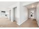 Open hallway with neutral tones and ample natural light, connecting living spaces seamlessly at 3132 W Meadowbend Dr, Monrovia, IN 46157