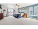Spacious main bedroom with lake view, carpet floors, ceiling fan, and beautiful decorations at 3132 W Meadowbend Dr, Monrovia, IN 46157