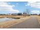 Picturesque walking path along a pond, connecting you with nature and neighborhood amenities at 3132 W Meadowbend Dr, Monrovia, IN 46157