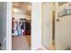 Bright walk-in closet featuring a shower area and organized storage for clothing and accessories at 3132 W Meadowbend Dr, Monrovia, IN 46157