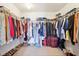 Well-organized walk-in closet with rods, shelves, shoes, and luggage storage, maximizing space efficiency at 3132 W Meadowbend Dr, Monrovia, IN 46157