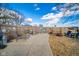 Entertain in this backyard with lounging area, fire pit, and ample seating perfect for gatherings at 323 Norris Dr, Anderson, IN 46013