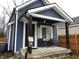 Inviting blue home featuring a welcoming front porch perfect for relaxing outdoors at 3610 E 28Th St, Indianapolis, IN 46218
