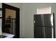 Modern kitchen with stainless steel refrigerator and efficient shelving at 3610 E 28Th St, Indianapolis, IN 46218