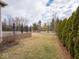 Backyard featuring a wooden deck and tasteful landscaping that enhances the home's curb appeal at 3791 Harveys Path, Greenwood, IN 46143