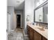 Bathroom featuring a shower, tile floor, and vanity with sink at 3791 Harveys Path, Greenwood, IN 46143