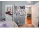 Comfortable bedroom showcasing a decorative wall, closet and doorway to the rest of the house at 3791 Harveys Path, Greenwood, IN 46143