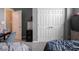 Bedroom featuring neutral walls, carpeted floor, a closet and a doorway to the hall at 3791 Harveys Path, Greenwood, IN 46143