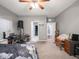 Spacious bedroom featuring a ceiling fan, neutral walls, and plush carpet at 3791 Harveys Path, Greenwood, IN 46143