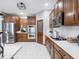 Updated kitchen with stainless steel appliances, subway tile backsplash, and custom cabinetry at 3791 Harveys Path, Greenwood, IN 46143