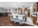 Modern kitchen with a large island, stainless steel appliances, and wooden cabinetry at 3791 Harveys Path, Greenwood, IN 46143