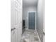 Laundry room featuring washer and dryer hookups, overhead lighting, and additional storage at 3791 Harveys Path, Greenwood, IN 46143