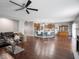Expansive open-concept area seamlessly connects living and kitchen spaces with hardwood flooring and modern finishes at 3791 Harveys Path, Greenwood, IN 46143