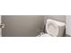 Bathroom featuring a toilet with an open lid and a toilet paper holder at 3791 Harveys Path, Greenwood, IN 46143